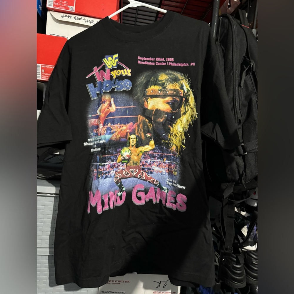 1996 WWF vintage in your house shirt.